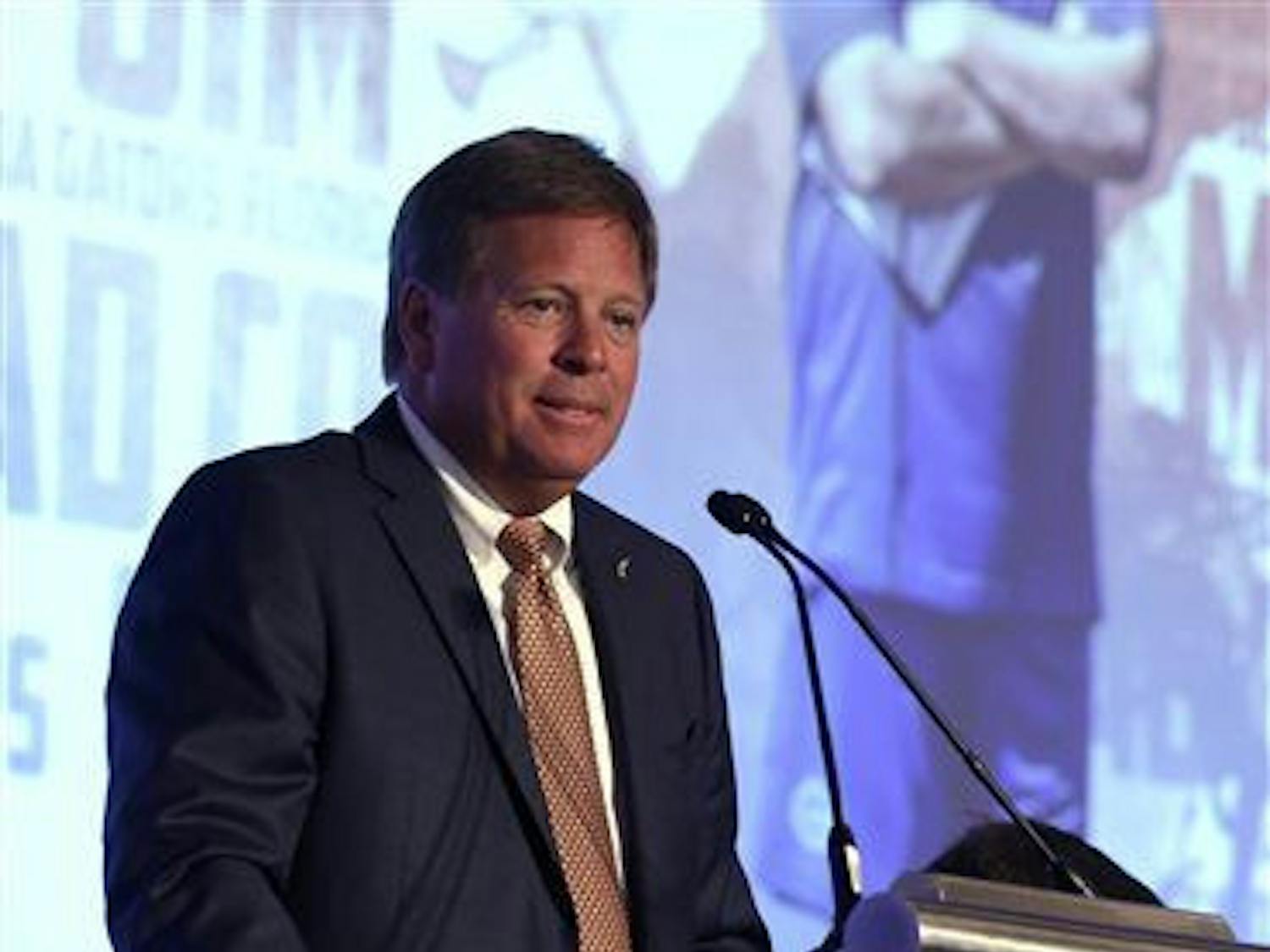 Florida coach Jim McElwain speaks to the media during the NCAA college football Southeastern Conference Media Days, Monday, July 13, 2015, in Hoover, Ala. (AP Photo/Butch Dill)