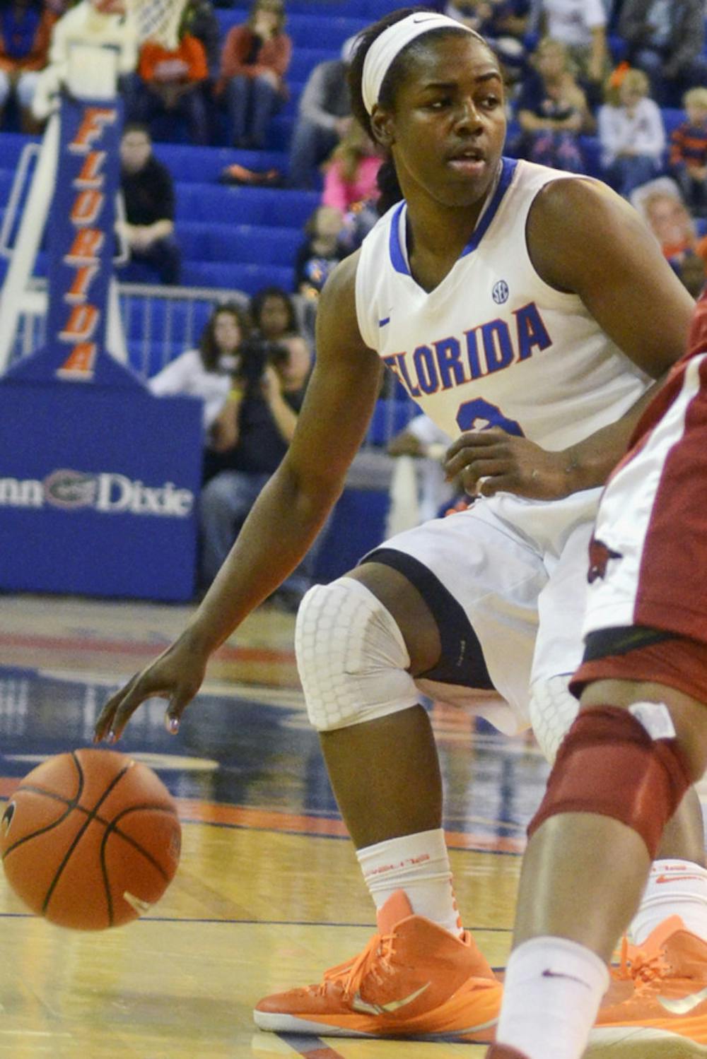 <p>January Miller drives into the lane during Florida's 72-58 win against Arkansas on Sunday in the O'Connell Center.</p>