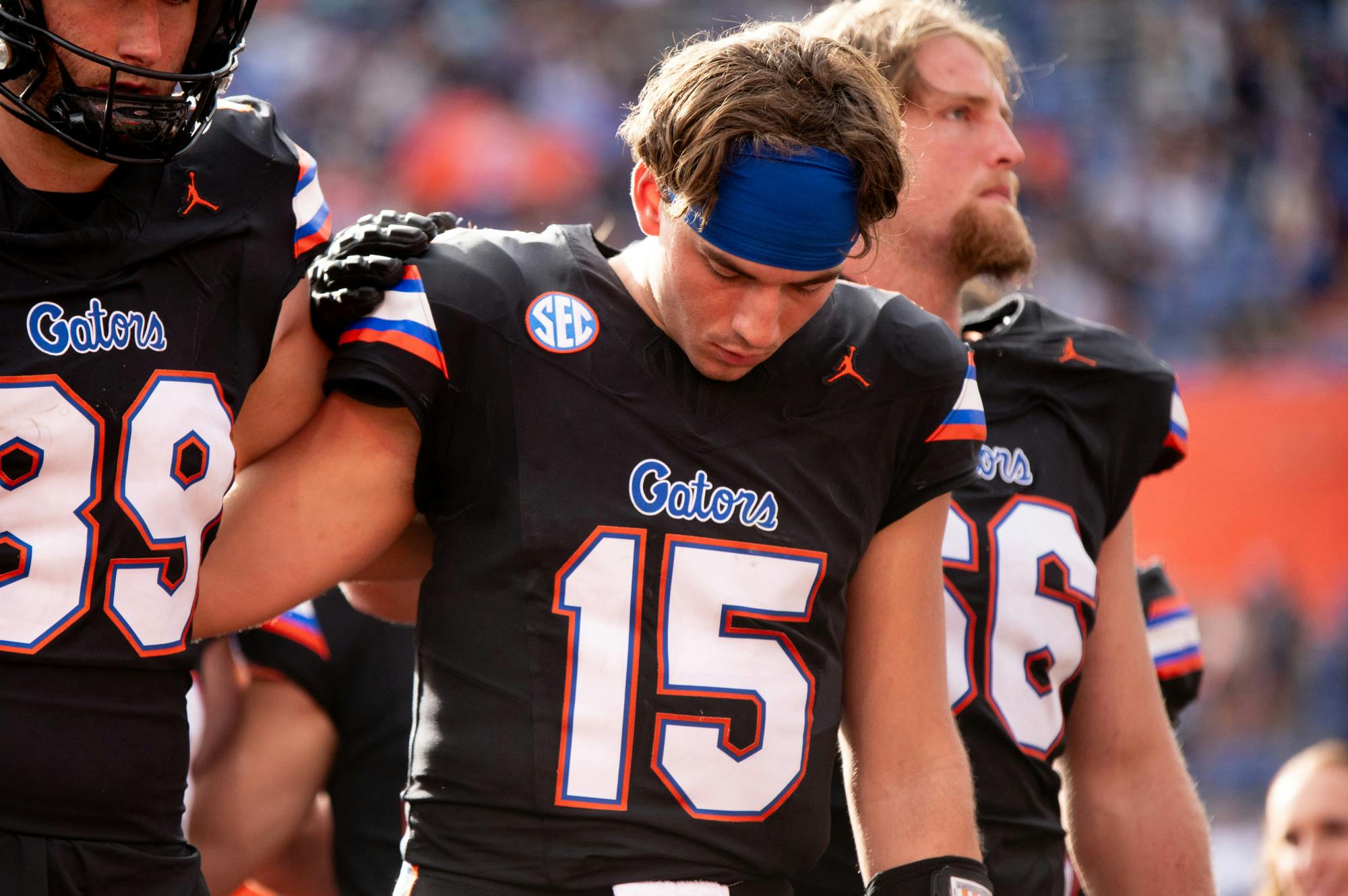 Redshirt junior quarterback Graham Mertz is embraced by his teammates in the Gators’ 39-36 loss to the Arkansas Razorbacks on Saturday, Nov. 4, 2023. 