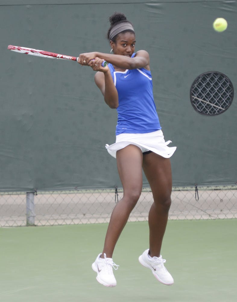 Freshman Brianna Morgan hits a backhand to return a ball during a match against Tennessee on March 17. 