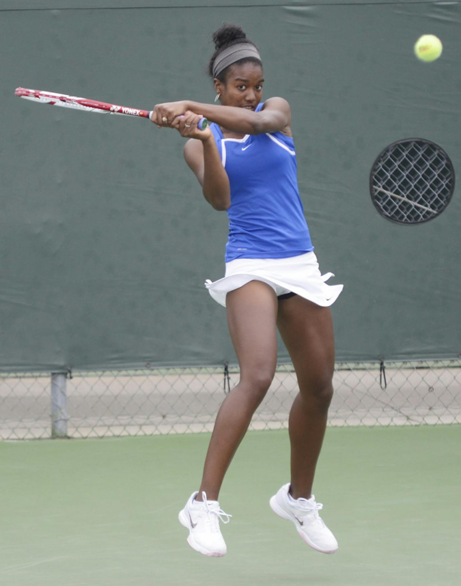 Freshman Brianna Morgan hits a backhand to return a ball during a match against Tennessee on March 17. 