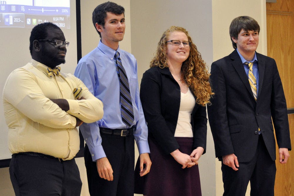 <p>From left: Santa Fe Student Government Senator-elect Iyanuoluwa “Isreal” Okeowo poses for a photo with President-elect Conor Flynn, Vice-President-elect Hannah Gwynn and Treasurer-elect Justin Deese at the senate meeting on Wednesday.</p>