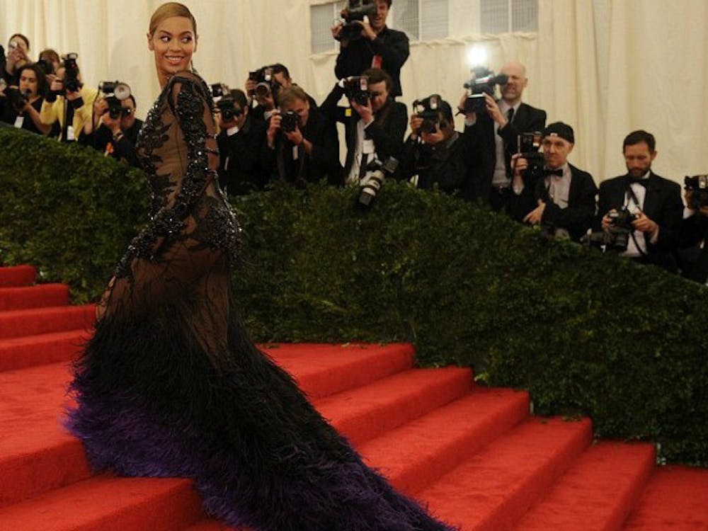 <p>Beyonce with punk-inspired accessories.&nbsp;</p>