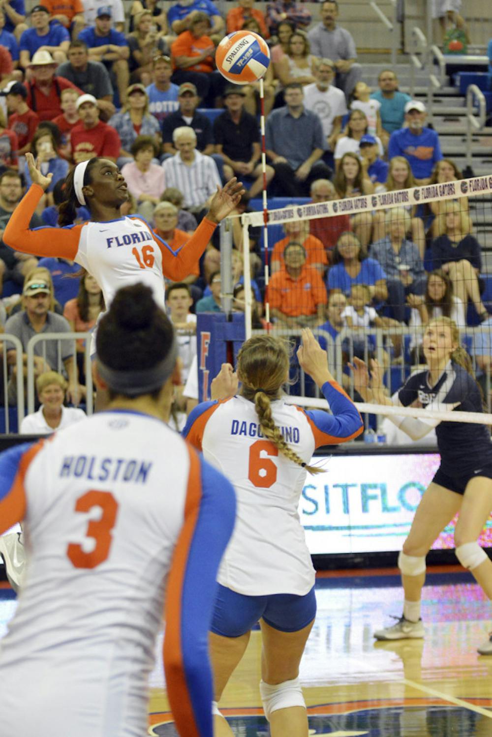 <p>Simone Antwi (16) hits the ball over the net for a kill attempt during Florida's 3-0 win against Ole Miss in the O'Connell Center.</p>