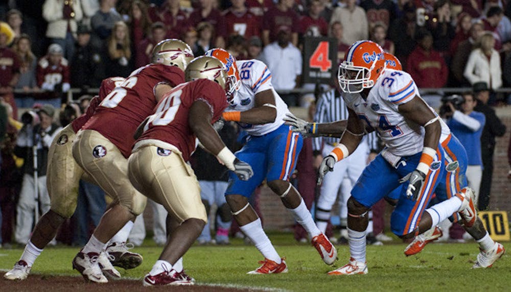 <p>Florida junior Lerentee McCray (34) appears to have claimed the starting job at strong-side linebacker alongside Jon Bostic and Jelani Jenkins after playing a limited role at defensive end last season.</p>