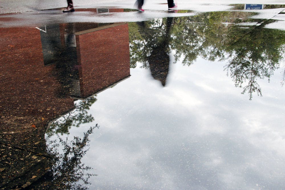 Students faced rainy weather and puddles on campus on Wednesday.