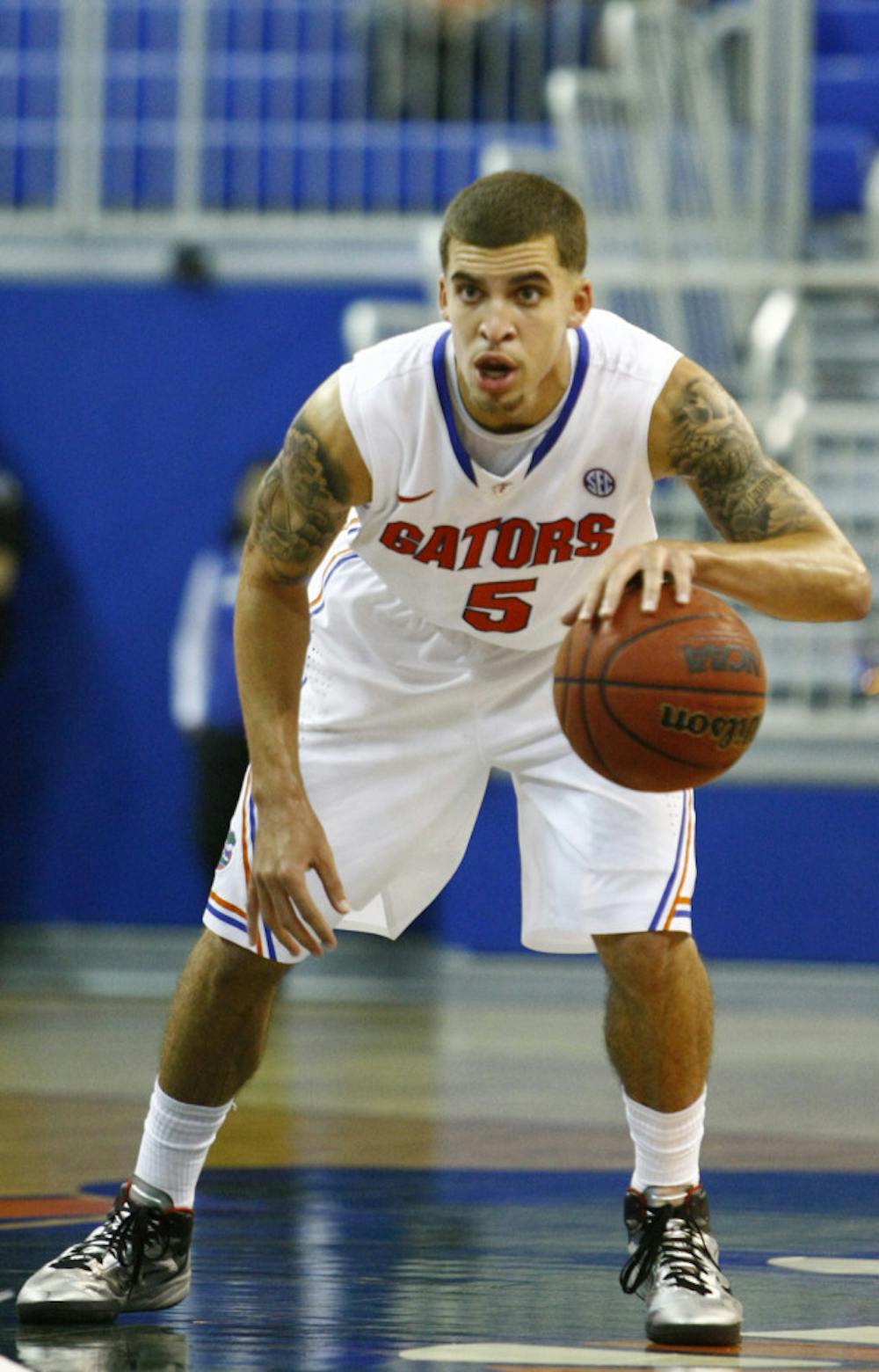 <p align="justify">Scottie Wilbekin dribbles down the court during Florida’s 101-71 victory against Nebraska-Kearney on Nov. 1.</p>