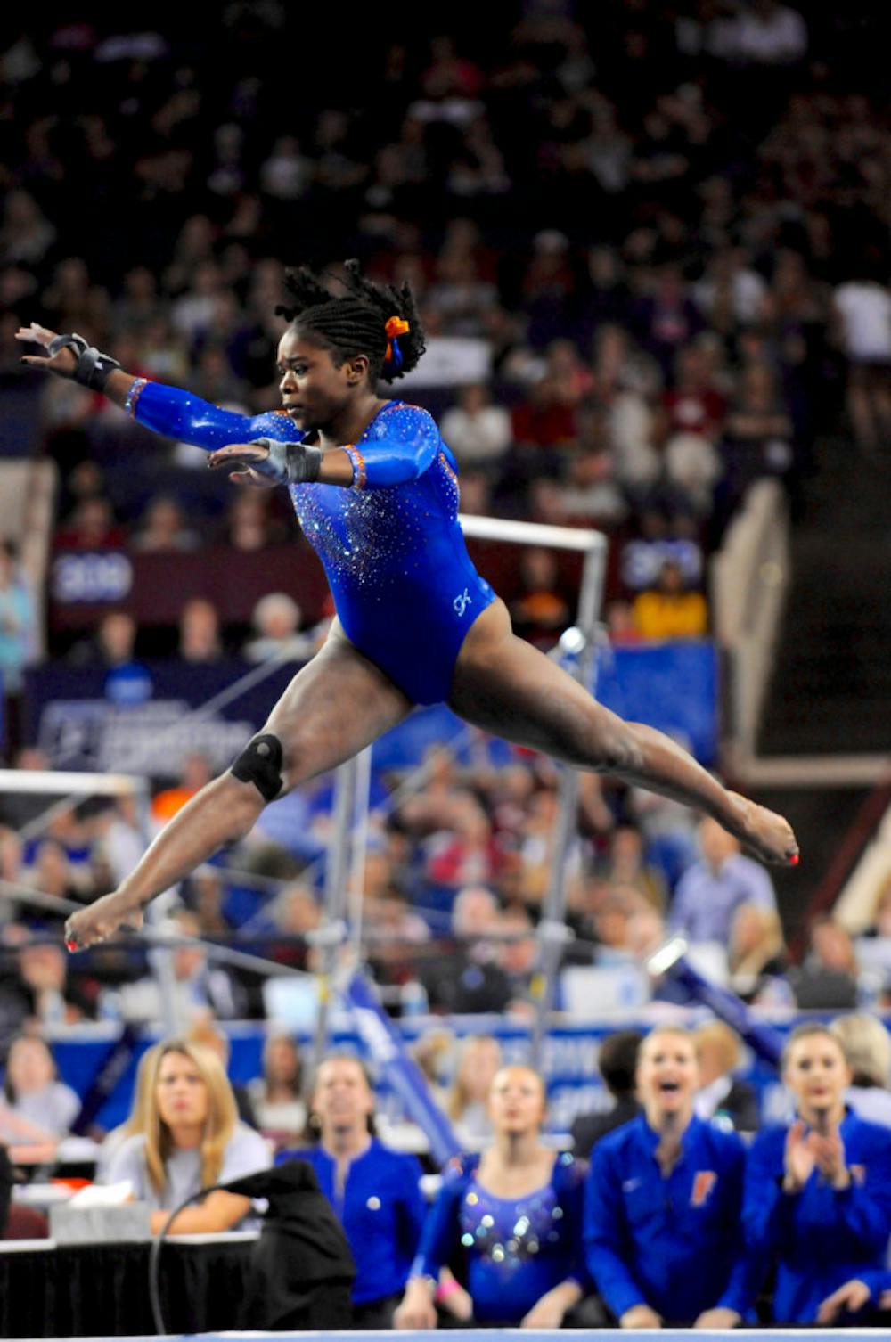 <p>Alicia Boren performs her floor exercise routine during the NCAA Gymnastics Super Six on April 16, 2016, in Fort Worth, Texas.</p>