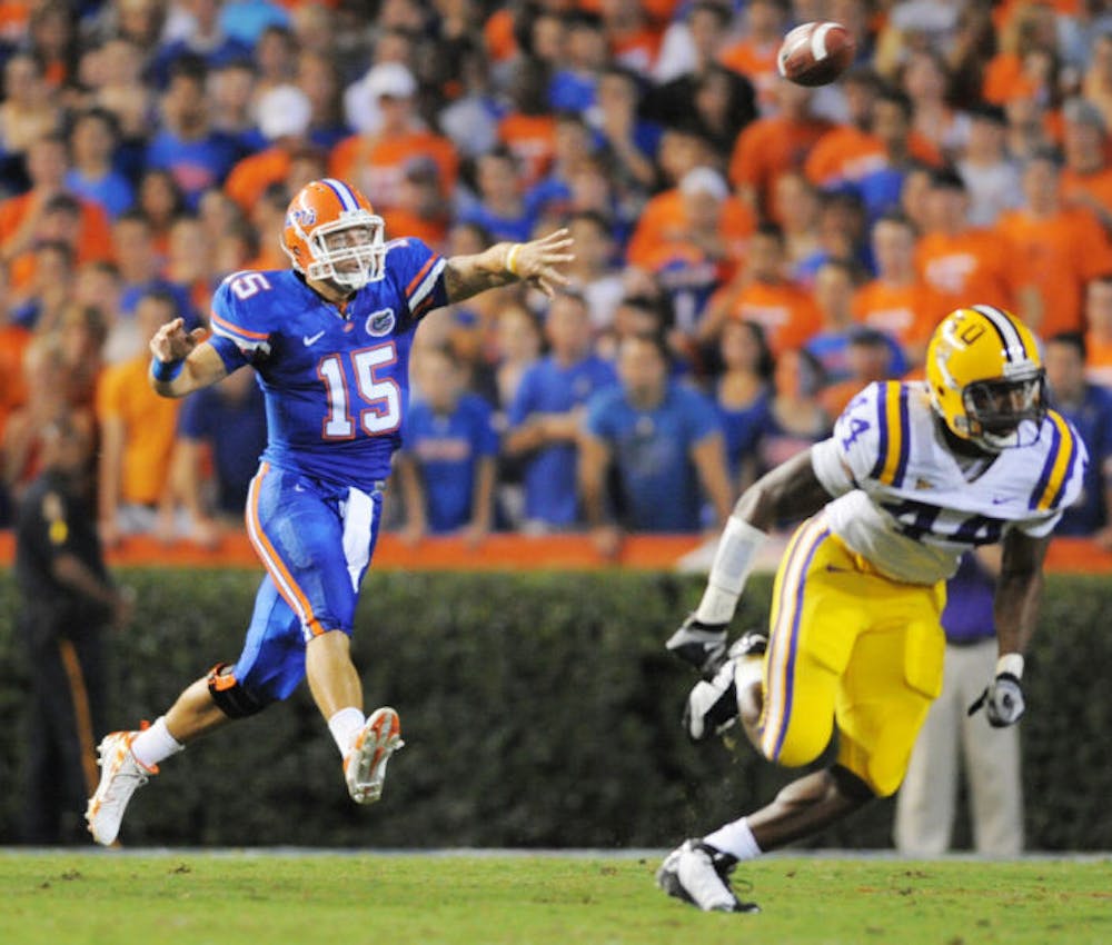 <p>Former Florida quarterback Tim Tebow throws a pass during UF’s 51-21 win against LSU in Ben Hill Griffin Stadium on Oct. 11, 2008.</p>