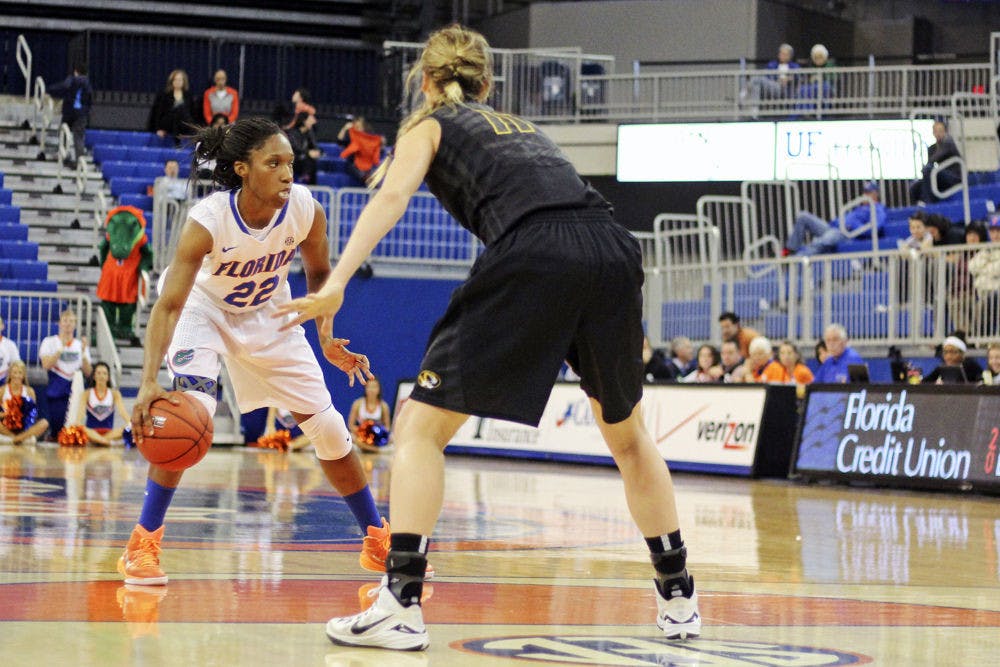 <p>Kayla Lewis dribbles during Florida's 68-52 loss to Missouri on Tursday in the O'Connell Center.</p>