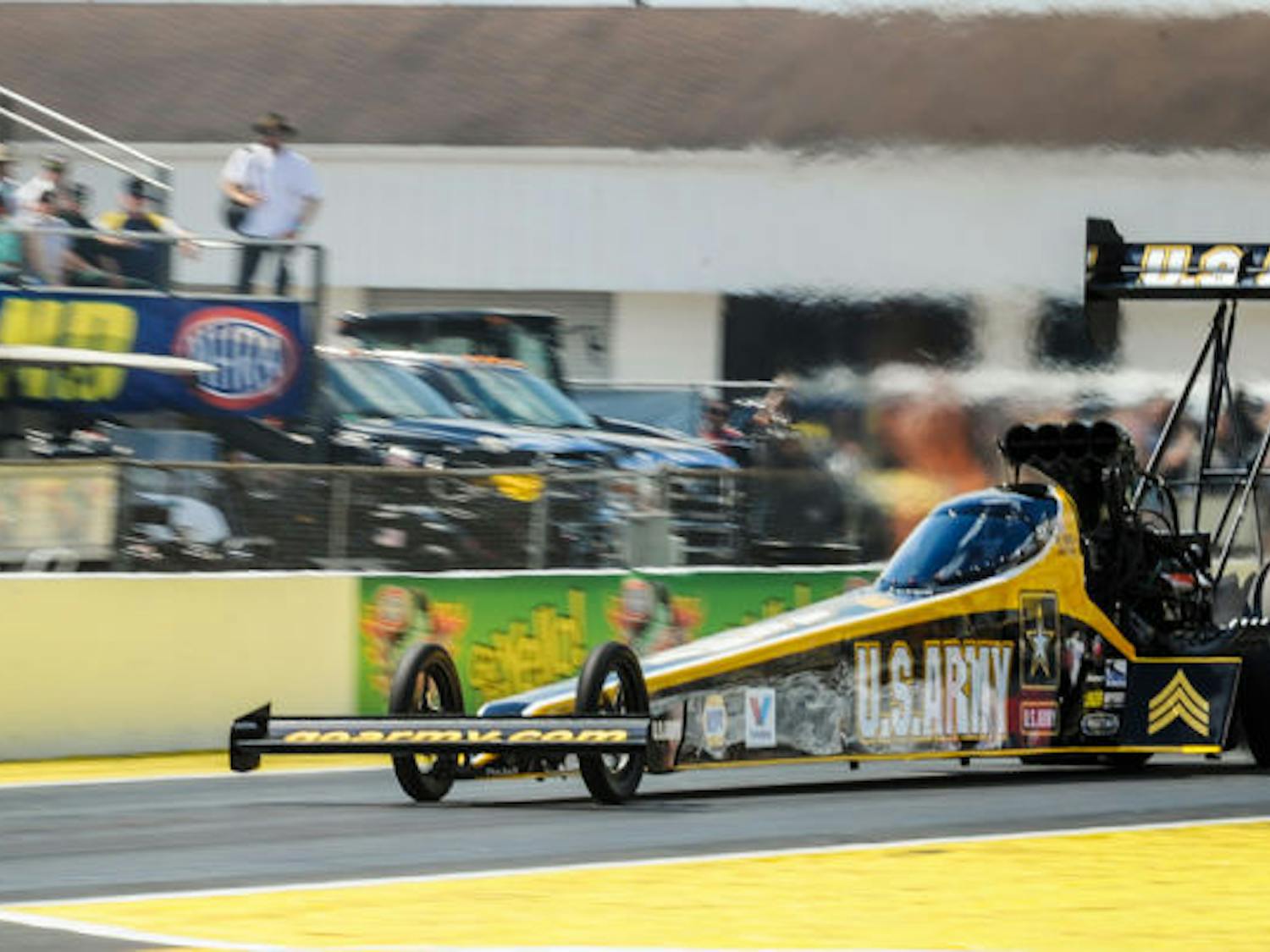 Tony Schumacher races his U.S. Army Top Fuel dragster down the track Saturday during the 45th annual Amalie Motor Oil NHRA Gatornationals at Gainesville Raceway. Gatornationals draws 100,000 spectators every year. Schumacher is a seven-time Top Fuel world champion. 