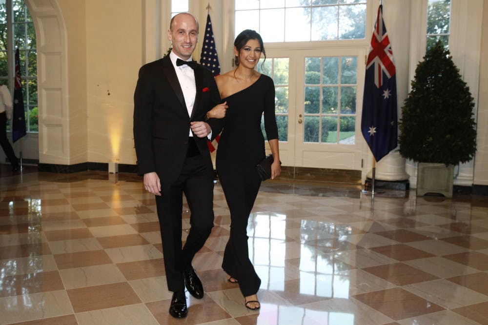 Stephen Miller, President Donald Trump's White House senior adviser, left, and Katie Waldman arrive for a State Dinner with Australian Prime Minister Scott Morrison and Trump at the White House, Friday, Sept. 20, 2019, in Washington. (AP Photo/Patrick Semansky)