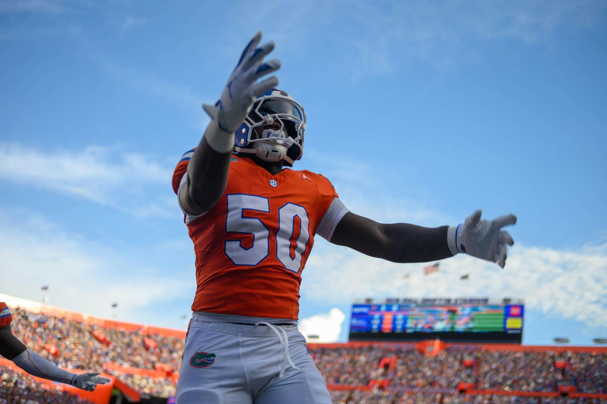 Florida inside linebacker Malik Morris (50) riles up the crowd in the first half of an NCAA college football game against Campbell, Saturday, Sept. 12, 2026, in Gainesville, Fla.