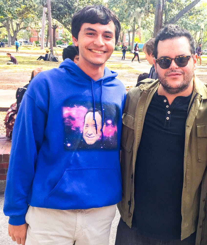 From left: Josh Levi, a 19-year-old UF materials science and engineering sophomore, poses with actor and comedian Josh Gad on the Plaza of the Americas on Monday. “He was definitely passionate about early voting,” Levi said.