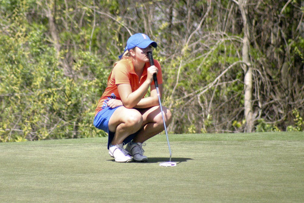 <p>Kelly Grassel lines up a shot during the 2015 SunTrust Gator Invitational on UF's Mark Bostick Golf Course.</p>