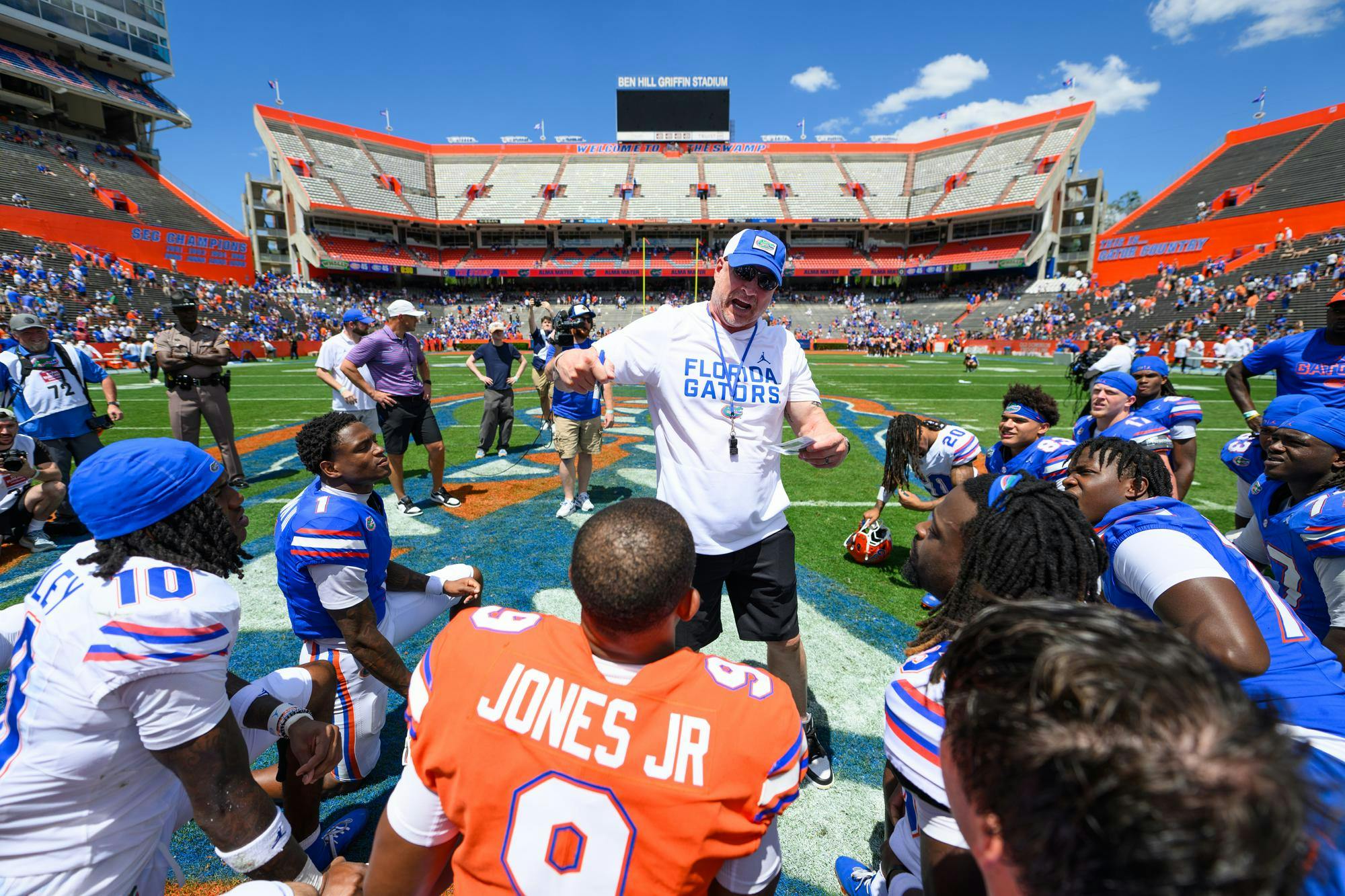 Director of football performace Rusty Whitt coaches in the post-game huddle after the Orange & Blue spring football game, Saturday, April 11, 2026, in Gainesville, Fla.