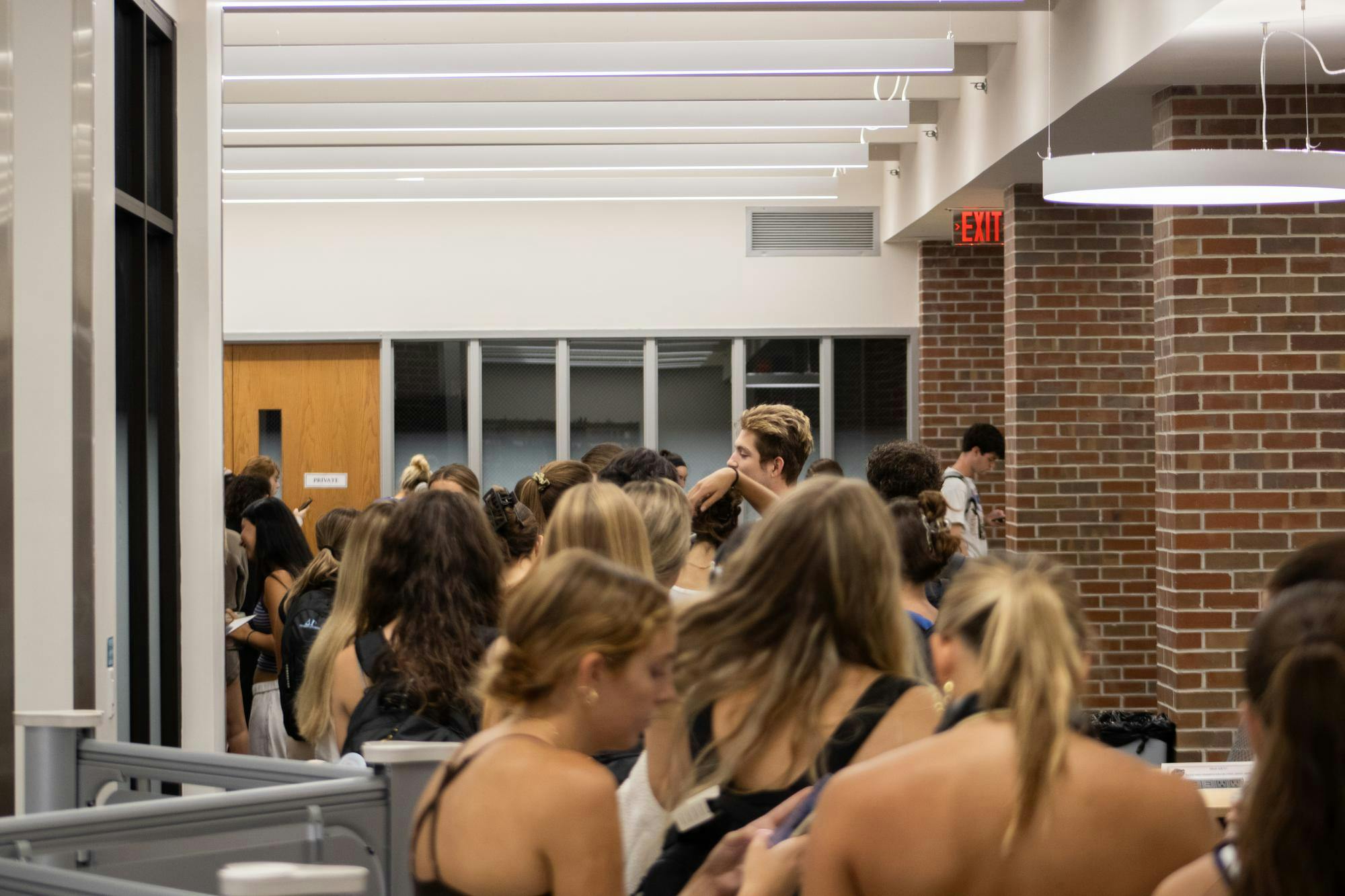 Students wait in line to vote at Norman Hall Education Library, Tuesday, Sept. 29, 2026, in Gainesville, Fla.