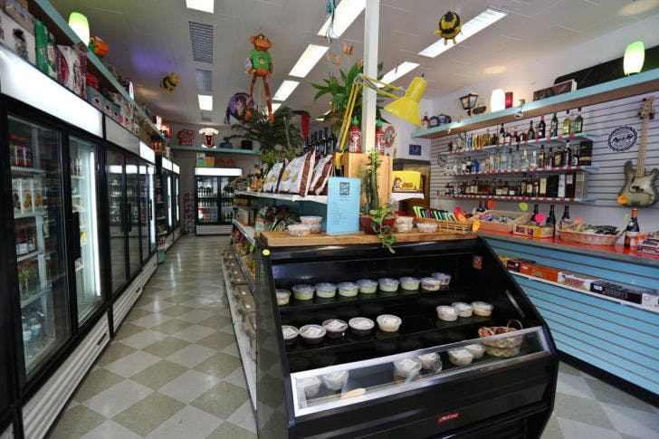 Pop A Top Corner Store and Downtown Bodega set up shop on 2 E. University Ave. last week. Owners of The Top restaurant opened the corner store that offers beers, liquors and vegan soft-serve ice cream.