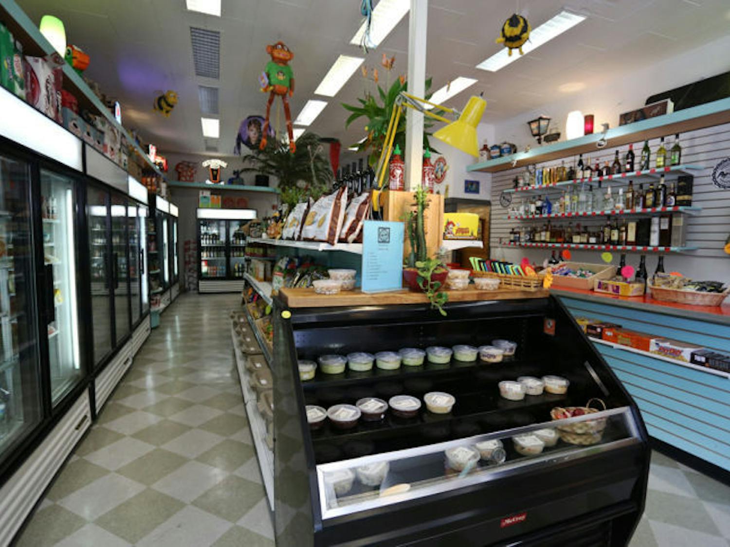 Pop A Top Corner Store and Downtown Bodega set up shop on 2 E. University Ave. last week. Owners of The Top restaurant opened the corner store that offers beers, liquors and vegan soft-serve ice cream.