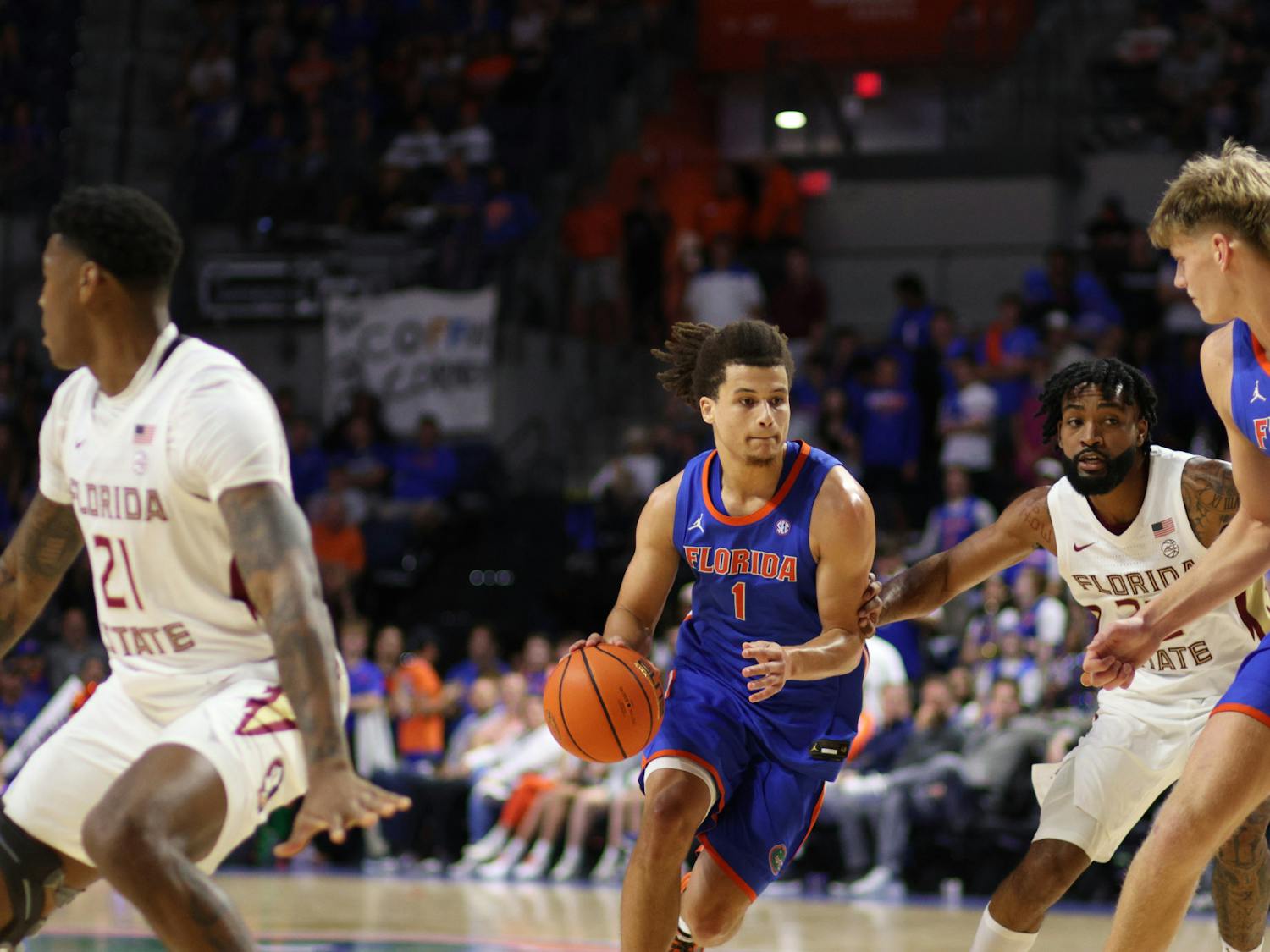Junior guard Walter Clayton Jr. drives with the basketball in the Gators’ 89-68 win against the Florida State Seminoles on Friday, Nov. 17, 2023. 