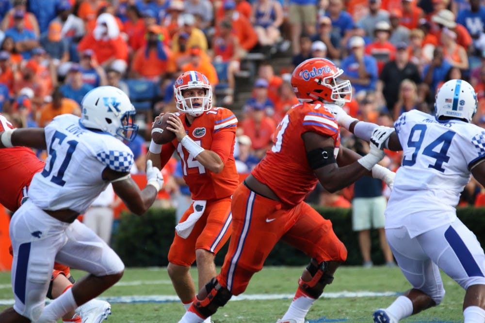 <p>Luke Del Rio (14) looks to pass during Florida's 45-7 win over Kentucky on Sept. 10, 2016, at Ben Hill Griffin Stadium.</p>