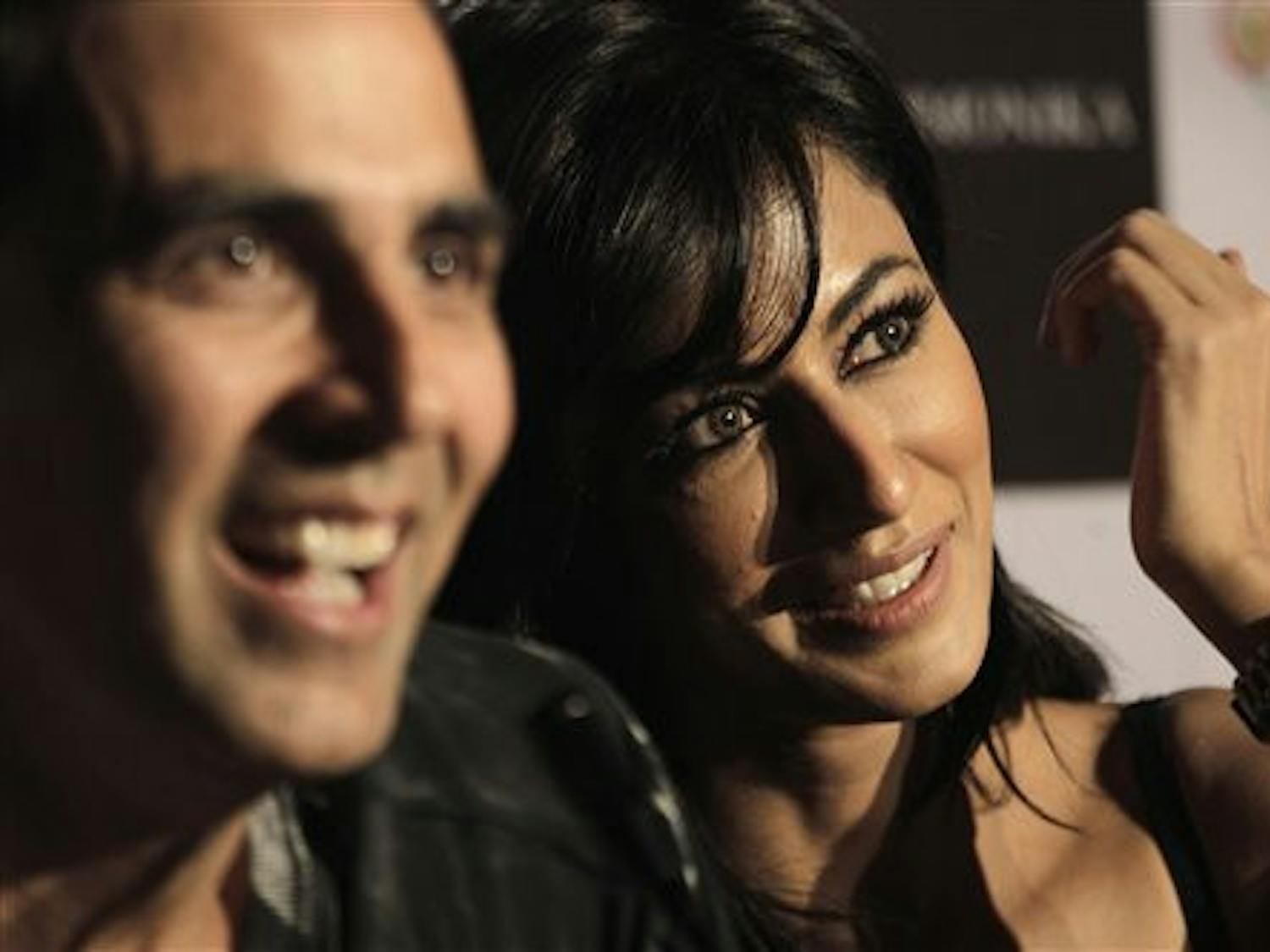 Actors Akshay Kumar and Chitrangada Singh speak at a news conference promoting their film "Desi Boyz," releasing Friday. "Desi Boyz" is the fifth film Kumar has appeared in during 2011 and the third film Singh has appeared in this year. Co-star John Abraham, not pictured, has been in four films this year, including "Desi Boyz."