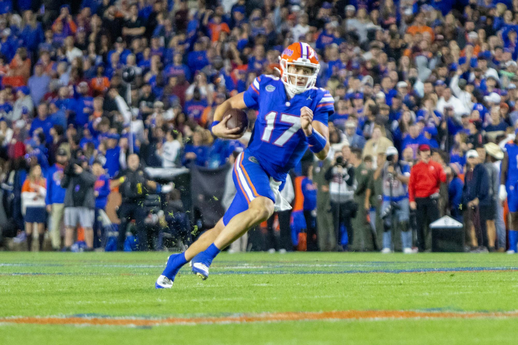 Redshirt freshman quarterback Max Brown runs the ball in the Gators' 24-15 loss to the Florida State Seminoles on Saturday, Nov. 25, 2023.