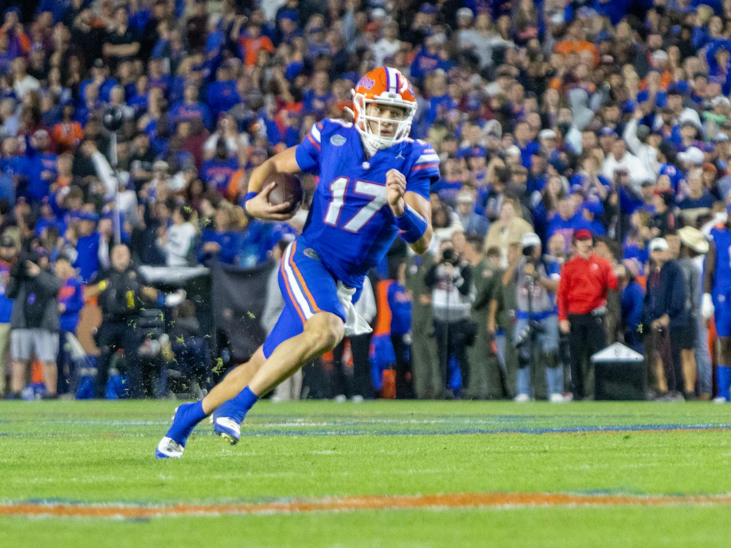 Redshirt freshman quarterback Max Brown runs the ball in the Gators' 24-15 loss to the Florida State Seminoles on Saturday, Nov. 25, 2023.
