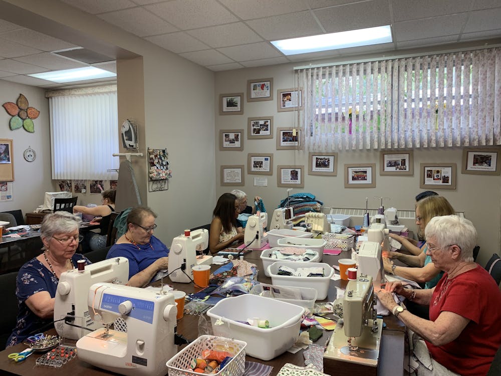<p><span>Volunteers work hard to sew reusable menstrual pads to help meet their goal of 200 kits.</span></p>