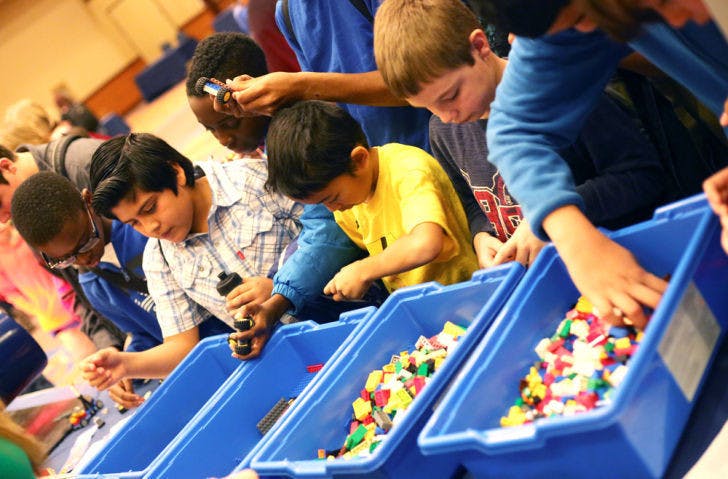 Gainesville elementary and middle school students play with Legos in the Reitz Union Grand Ballroom on Tuesday during the Engineering and Science Fair Day 1. The fair is part of UF’s Engineers’ Week.