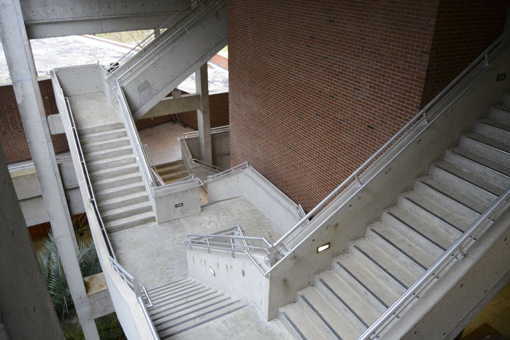 <p>Pictured are the handrails installed in the College of Music building last semester to address safety concerns of students and faculty. The handrails are part of an ongoing effort to improve the building, which will receive a $1.2 million roof renovation sometime this year.</p>