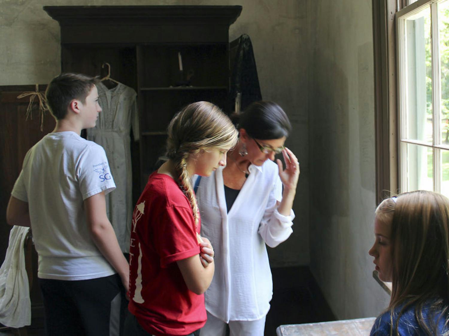 From left: River Saulsbury, Regan Saulsbury, Heather Saulsbury and Ruby Jane Saulsbury examine a room during a tour of the Historic Haile Homestead on June 7. Visitors on the tour learn about the history of the plantation, the Haile family, and more.