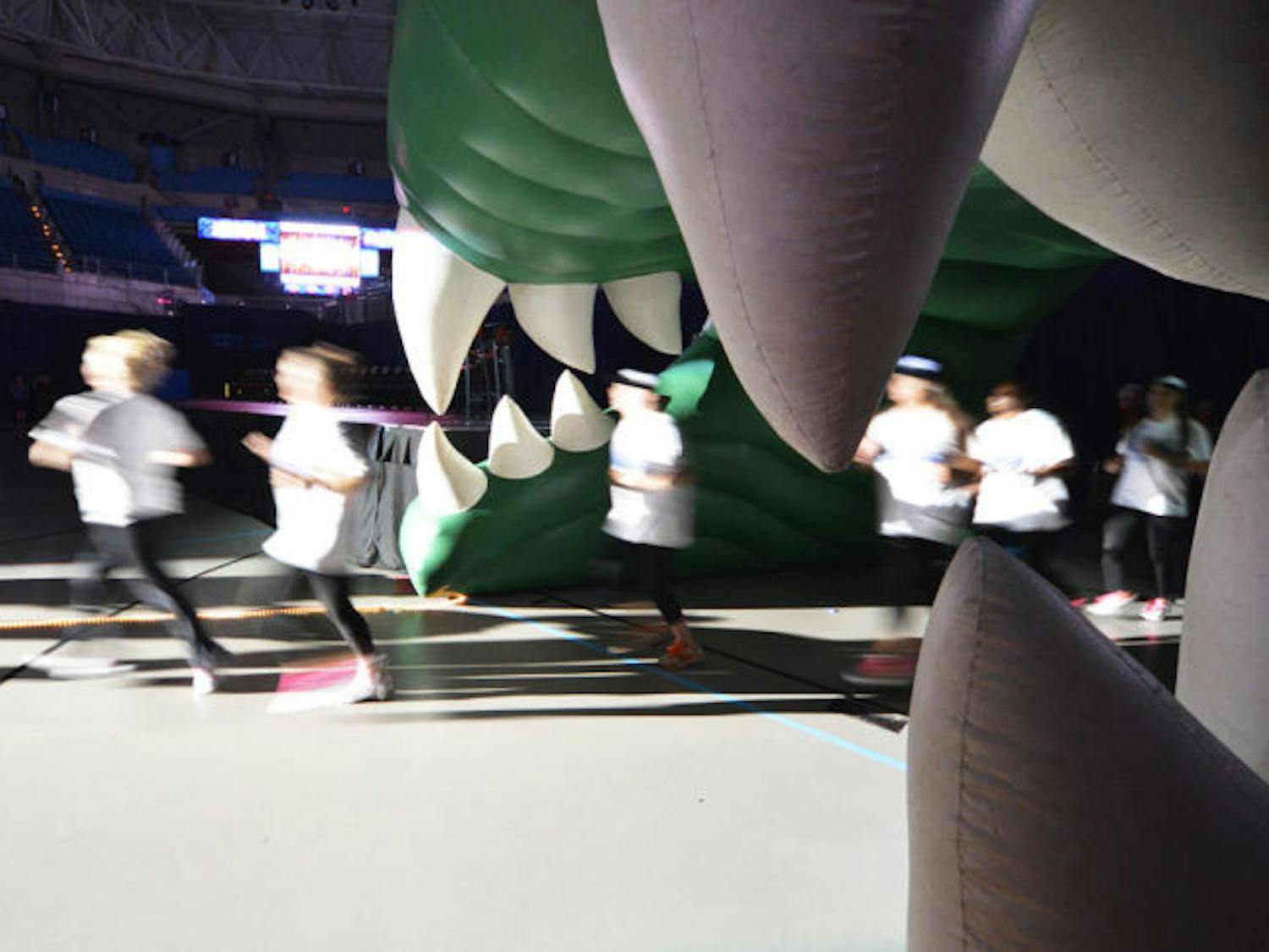 UF’s Gymnastics team celebrates its victory at the Stephen C. O’Connell Center on Monday evening. The team won first place at the national championships held in Los Angeles. They’re one of five teams to ever win a national championship in gymnastics.