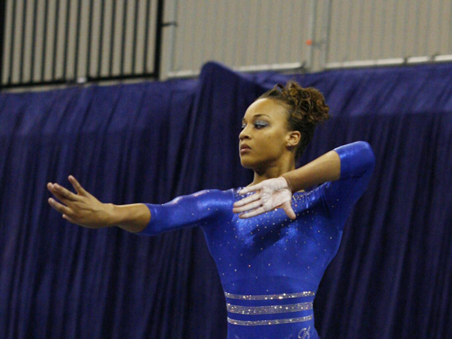 Sophomore Kytra Hunter performs her beam routine in a dual meet against Ball State on Jan. 4 in the O’Connell Center. Hunter won the all-around title at the NCAA Regionals on Saturday.