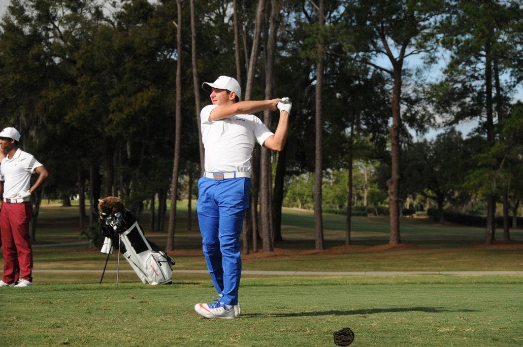 Alejandro Tosti follows through on his swing during the the SunTrust Gator Invitational on Feb. 18, 2017, at Mark Bostick Golf Course.