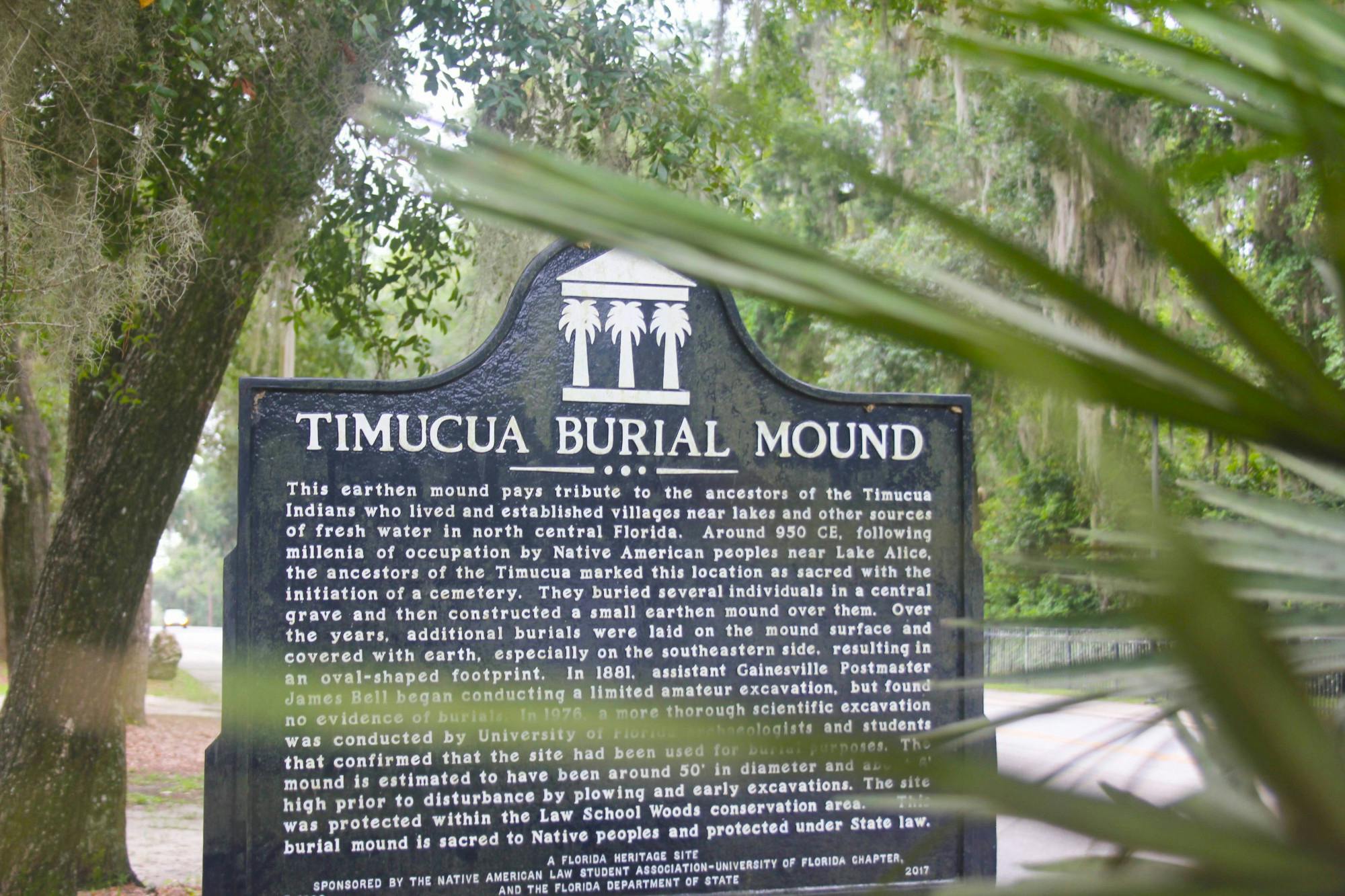 Signage giving a brief description of the Timucua tribe is seen near the Levin College of Law on Saturday, July 29, 2023. 
