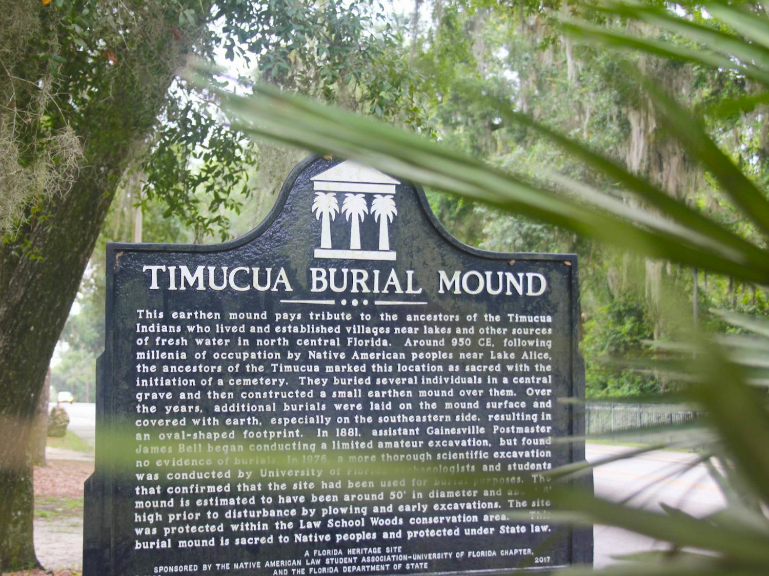 Signage giving a brief description of the Timucua tribe is seen near the Levin College of Law on Saturday, July 29, 2023. 