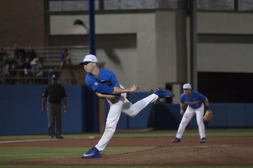 <p>UF pitcher Brady Singer throws a pitch during Florida's 2-0 win against Miami on Feb. 25, 2017, at McKethan Stadium.</p>