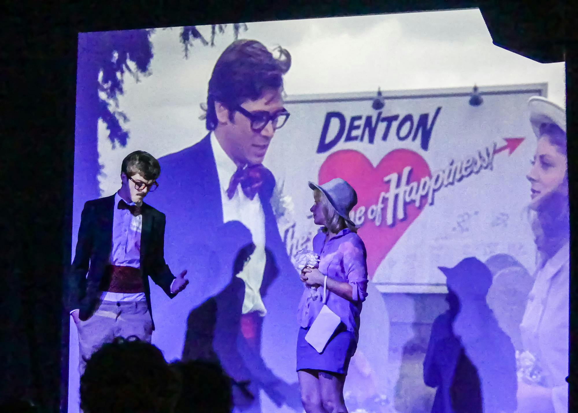 Jake Giacomini, left, and Emma Grimm, right, perform as Brad and Janet in "The Rocky Horror Picture Show" at The Wooly on Thursday, Oct. 9, 2025.