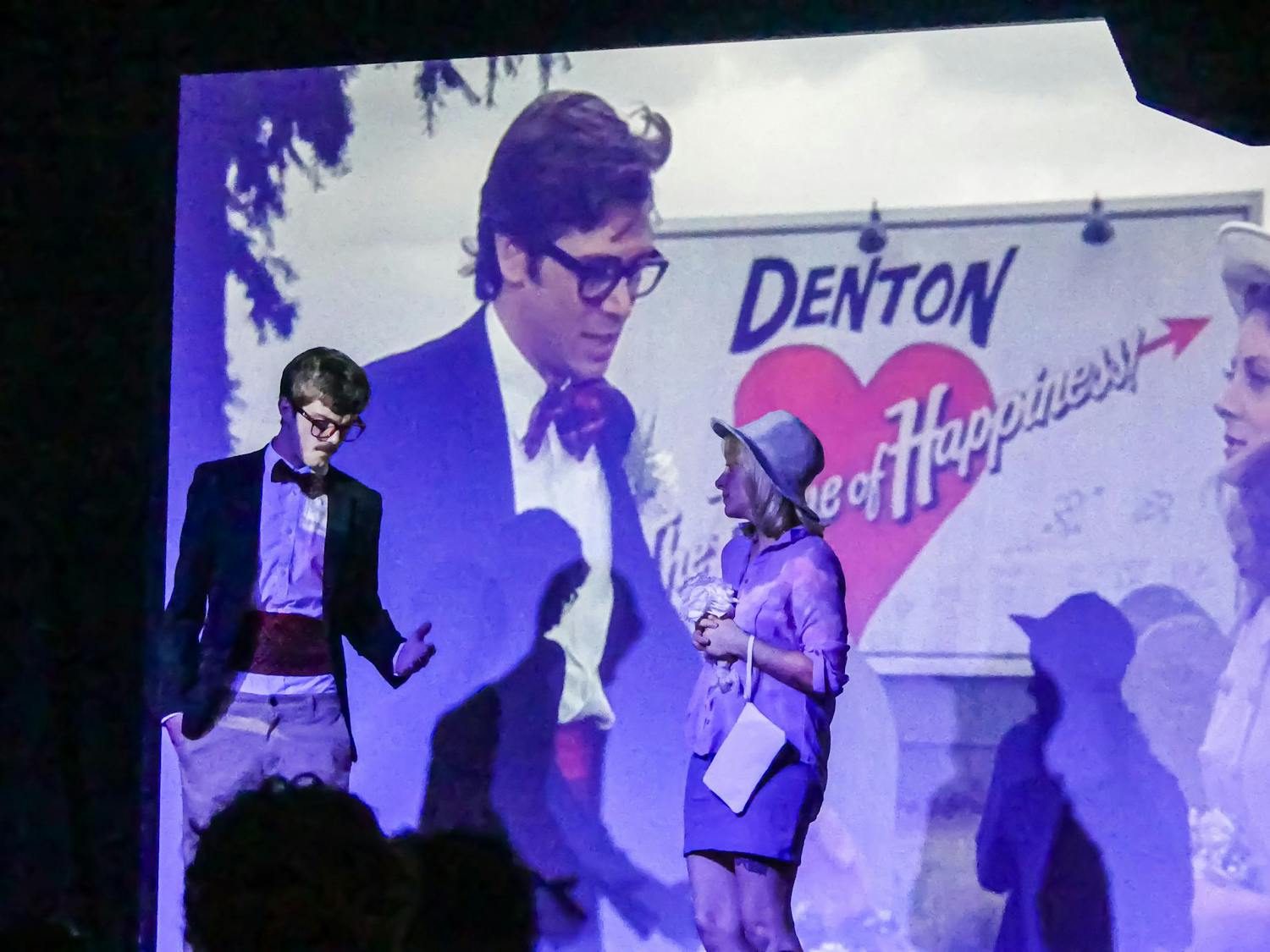 Jake Giacomini, left, and Emma Grimm, right, perform as Brad and Janet in "The Rocky Horror Picture Show" at The Wooly on Thursday, Oct. 9, 2025.