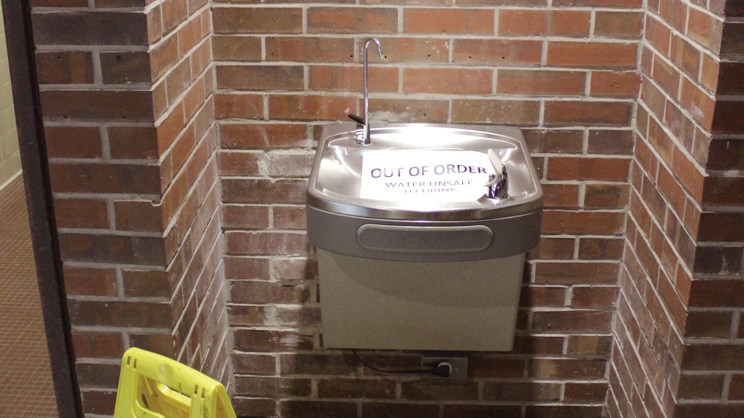 A water fountain in the east wing of Norman Hall is marked as out of order on Sept.17, 2015. Water in some parts of the building was deemed unsafe to drink.