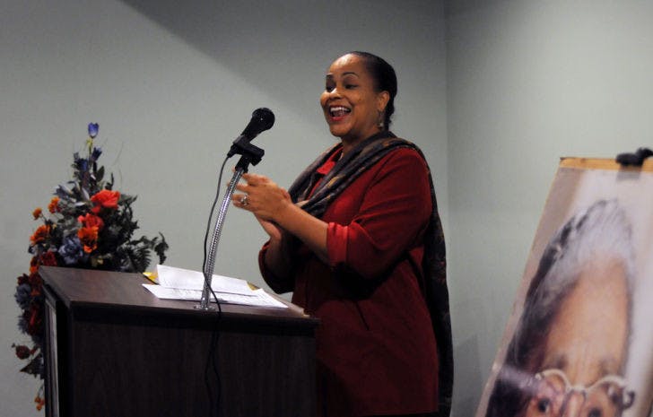 Patricia Hilliard-Nunn, UF lecturer of African-American studies, leads a congregation Thursday at the Wilhelmina Johnson Resource Center for the eighth anniversary of Rosa Parks’ death.