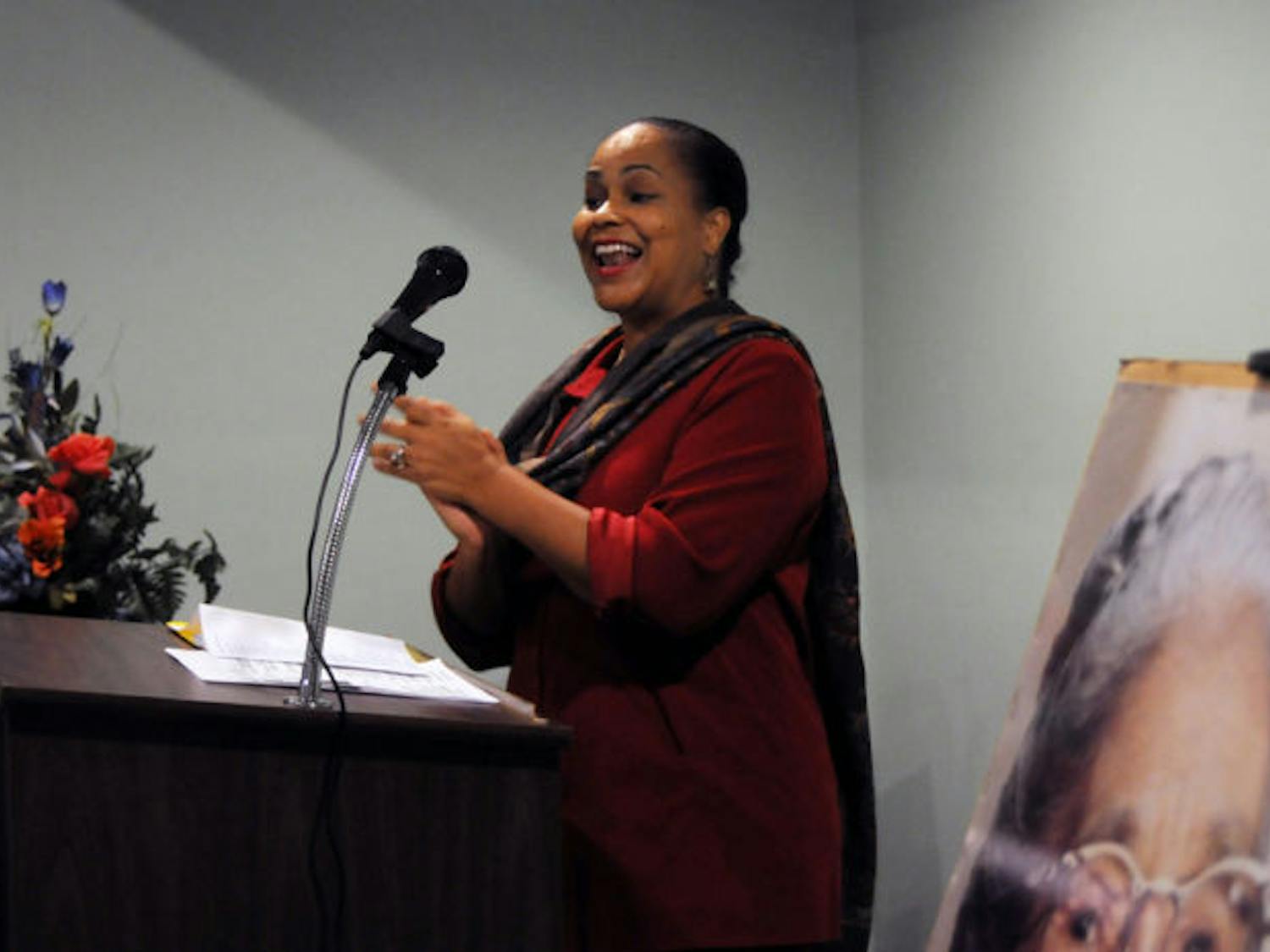Patricia Hilliard-Nunn, UF lecturer of African-American studies, leads a congregation Thursday at the Wilhelmina Johnson Resource Center for the eighth anniversary of Rosa Parks’ death.