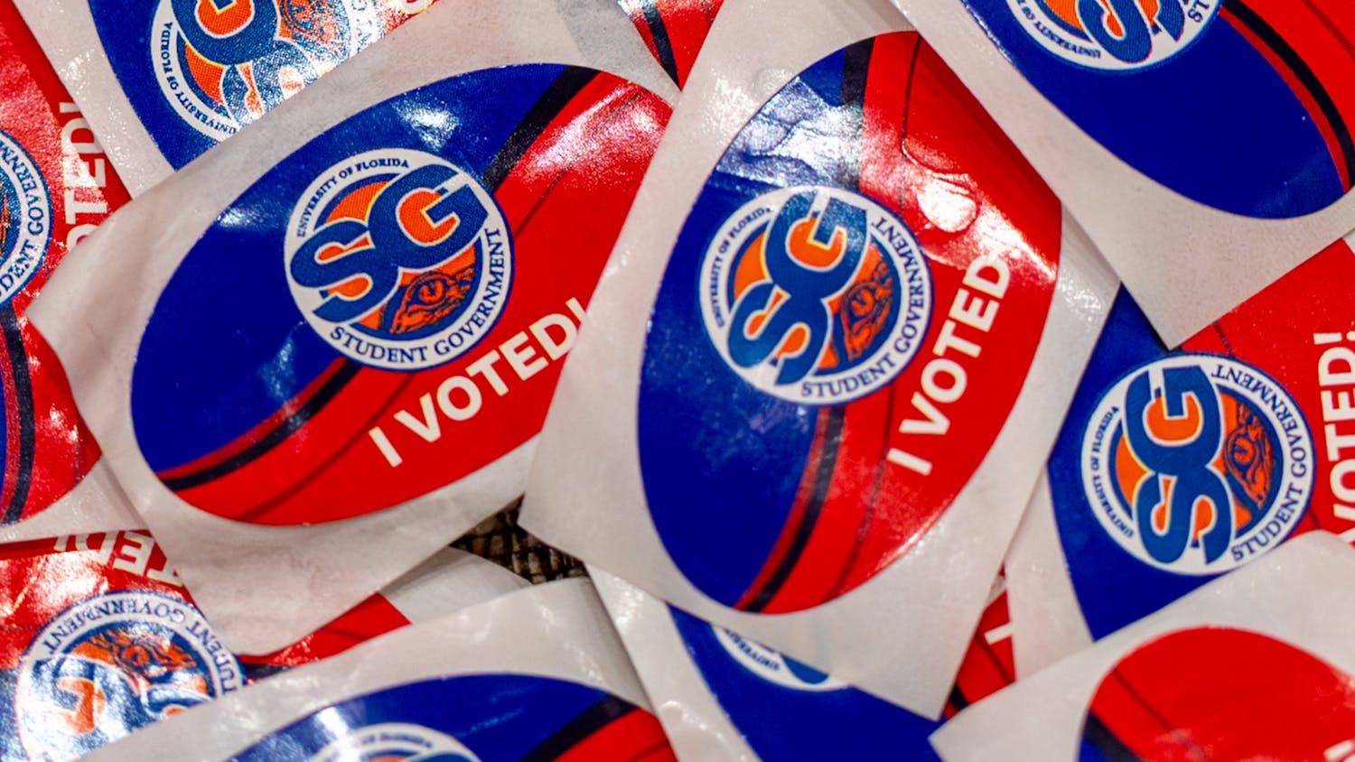 Participants voting in the University of Florida Student Government elections receive stickers upon returning their voting card. Photo Illustration captured Tuesday, Sept. 30, 2025.