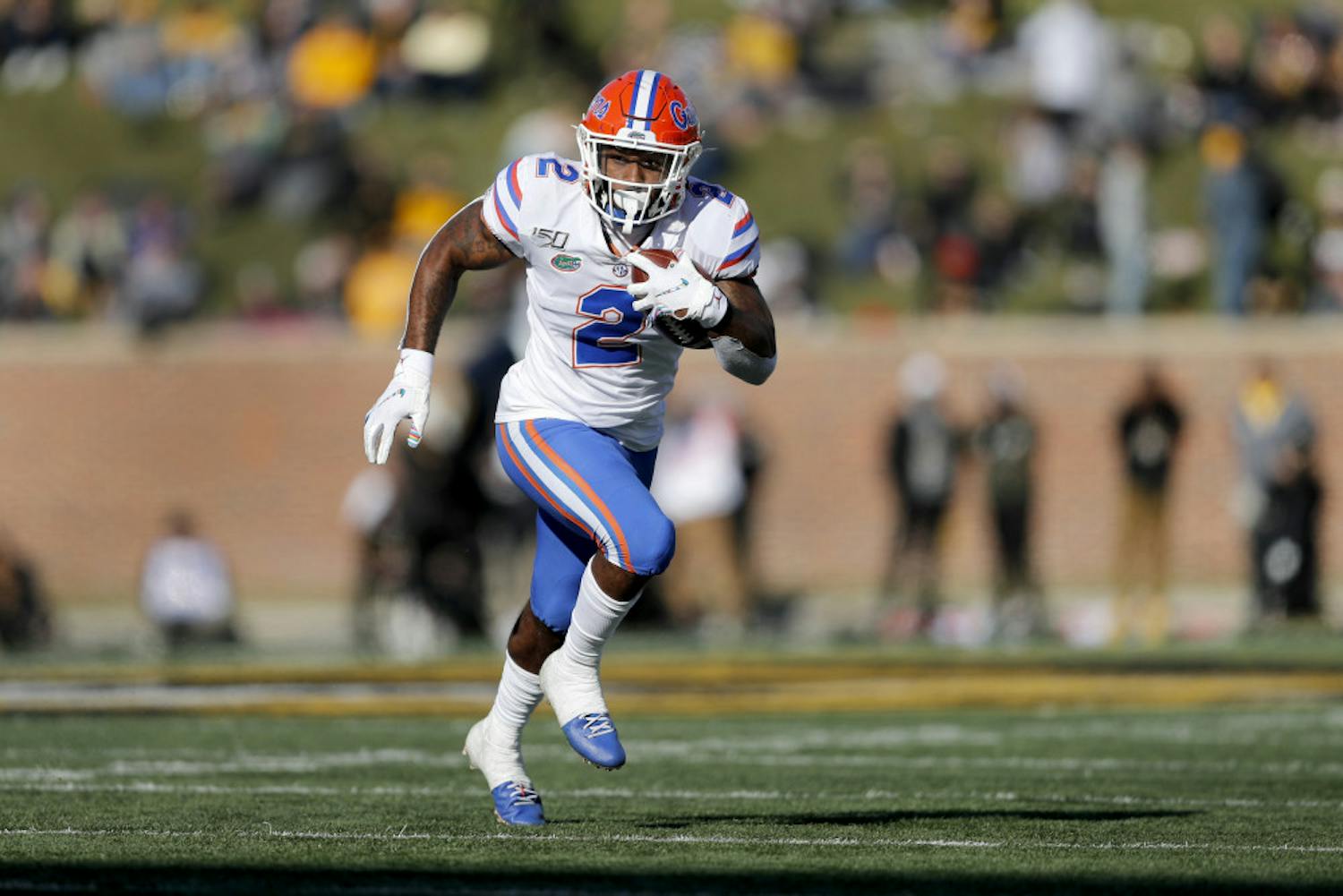 Florida running back Lamical Perine carries the ball for a first down during the second half of an NCAA college football game against Missouri, Saturday, Nov. 16, 2019, in Columbia, Mo. Florida won 23-6. (AP Photo/Jeff Roberson)