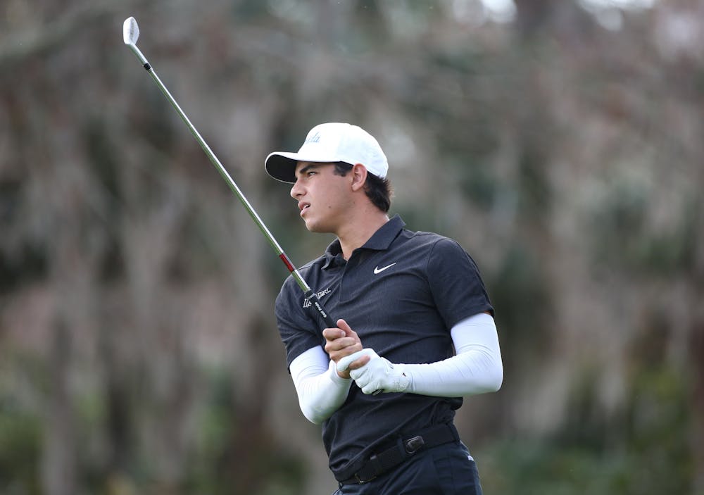 Florida redshirt freshman Miguel Leal swings his club in the Sea Best Invitational Tuesday, Jan. 31, 2023. Photo by Courtney Culbreath