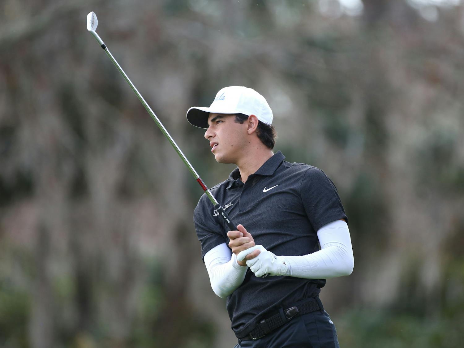 Florida redshirt freshman Miguel Leal swings his club in the Sea Best Invitational Tuesday, Jan. 31, 2023. Photo by Courtney Culbreath