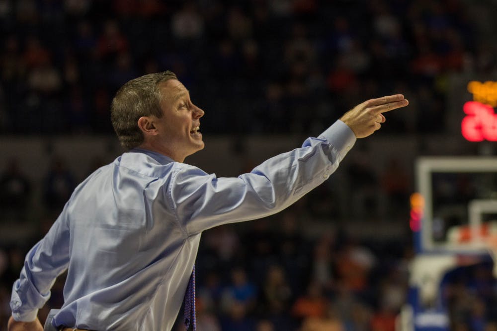 UF basketball coach Mike White is 89-53 in his four seasons with the Gators. His overall head coaching record is 190-93.  