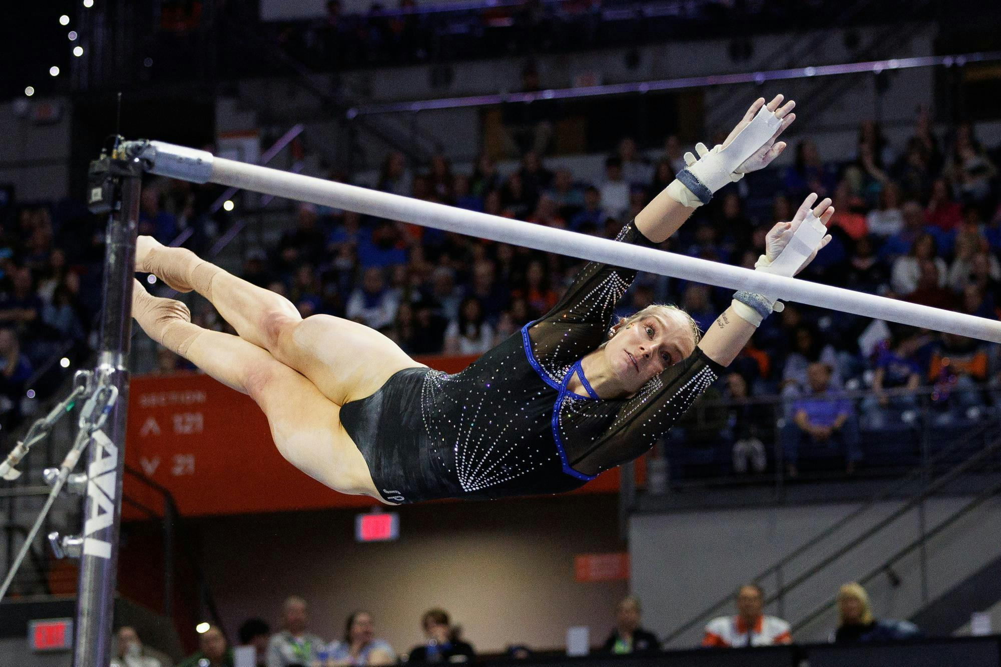 Florida gymnast Riley McCusker performs on the uneven bars during a NCAA gymnastics meet against Arkansas, Friday, Jan. 30, 2026, in Gainesville, Fla.