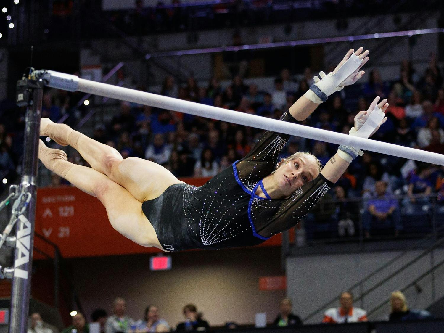 Florida gymnast Riley McCusker performs on the uneven bars during a NCAA gymnastics meet against Arkansas, Friday, Jan. 30, 2026, in Gainesville, Fla.